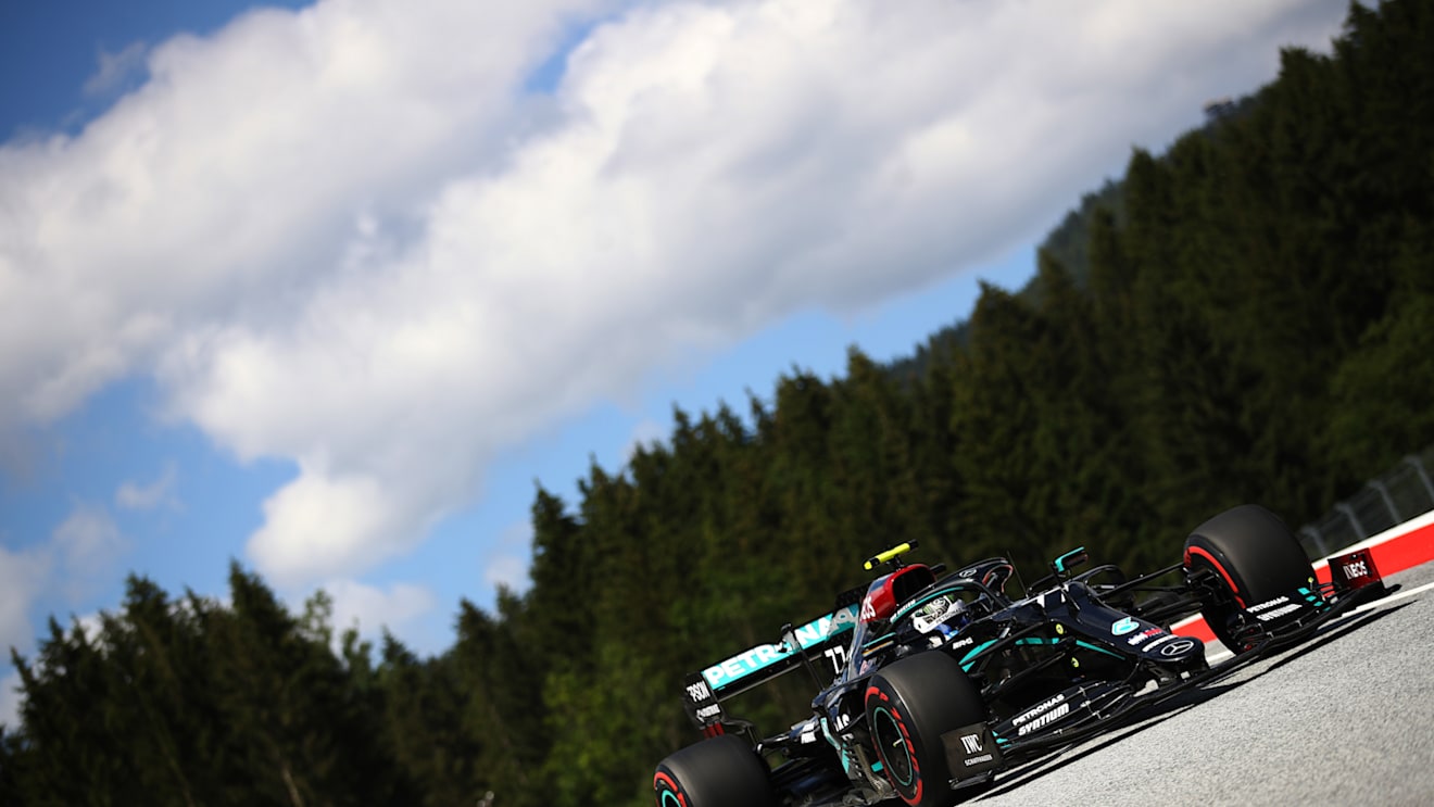 SPIELBERG, AUSTRIA - JULY 04: Valtteri Bottas of Finland driving the (77) Mercedes AMG Petronas F1 Team Mercedes W11 on track during qualifying for the Formula One Grand Prix of Austria at Red Bull Ring on July 04, 2020 in Spielberg, Austria. (Photo by Bryn Lennon/Getty Images)