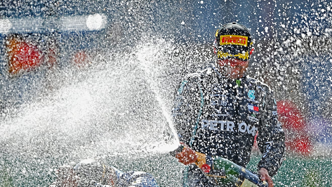 SPIELBERG, AUSTRIA - JULY 05:  Race winner Valtteri Bottas of Finland and Mercedes GP celebrates on the podium during the Formula One Grand Prix of Austria at Red Bull Ring on July 05, 2020 in Spielberg, Austria. (Photo by Clive Mason - Formula 1/Formula 1 via Getty Images)