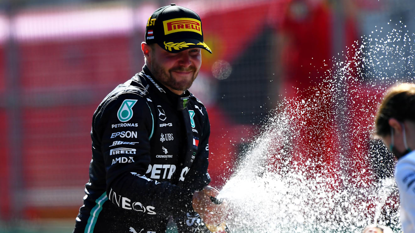 SPIELBERG, AUSTRIA - JULY 05: Race winner Valtteri Bottas of Finland and Mercedes GP celebrates on the podium during the Formula One Grand Prix of Austria at Red Bull Ring on July 05, 2020 in Spielberg, Austria. (Photo by Mario Renzi - Formula 1/Formula 1 via Getty Images)