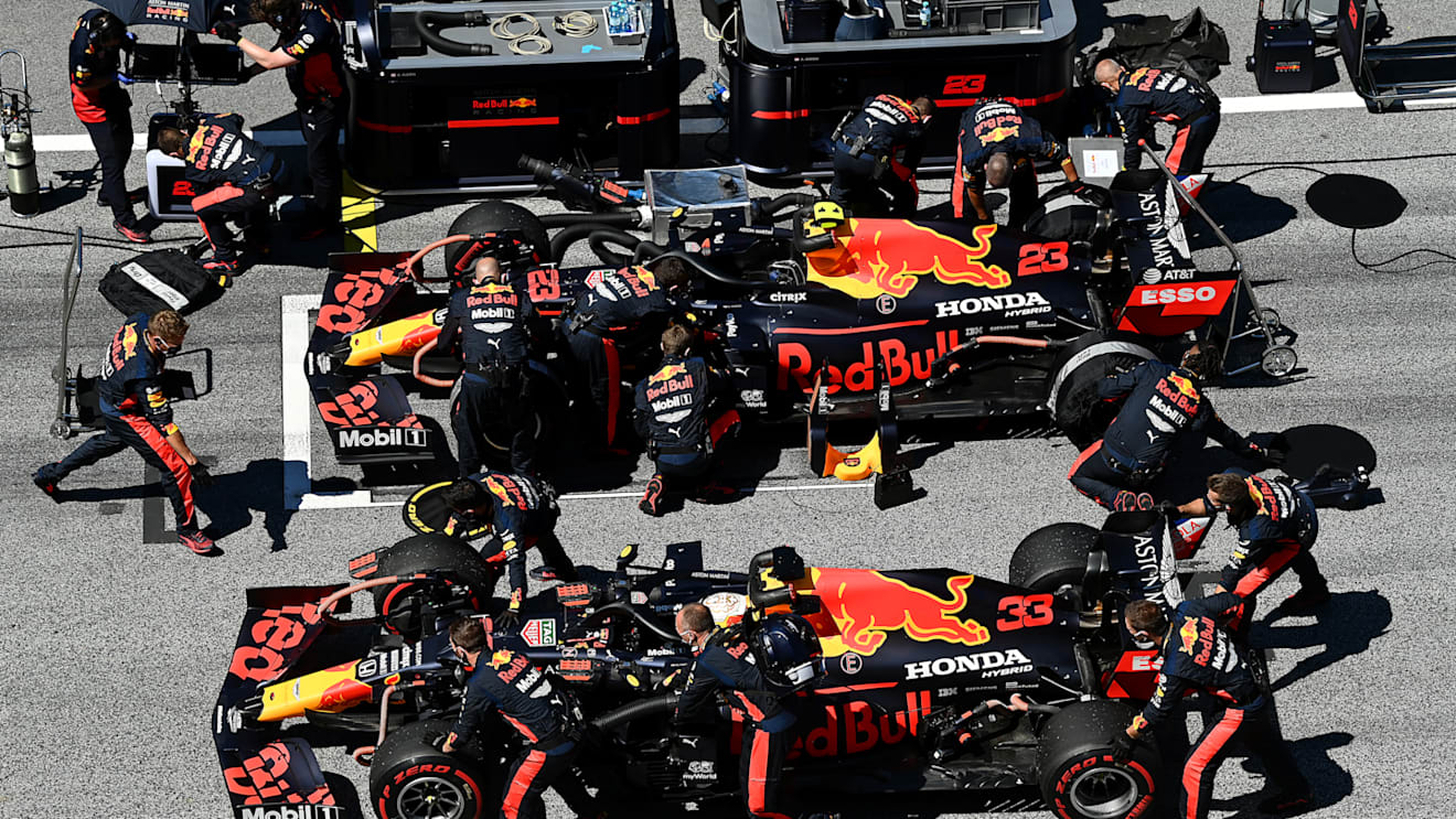 SPIELBERG, AUSTRIA - JULY 05: Alexander Albon of Thailand driving the (23) Aston Martin Red Bull Racing RB16 and Max Verstappen of the Netherlands driving the (33) Aston Martin Red Bull Racing RB16 prepare on the grid during the Formula One Grand Prix of Austria at Red Bull Ring on July 05, 2020 in Spielberg, Austria. (Photo by Clive Mason - Formula 1/Formula 1 via Getty Images)