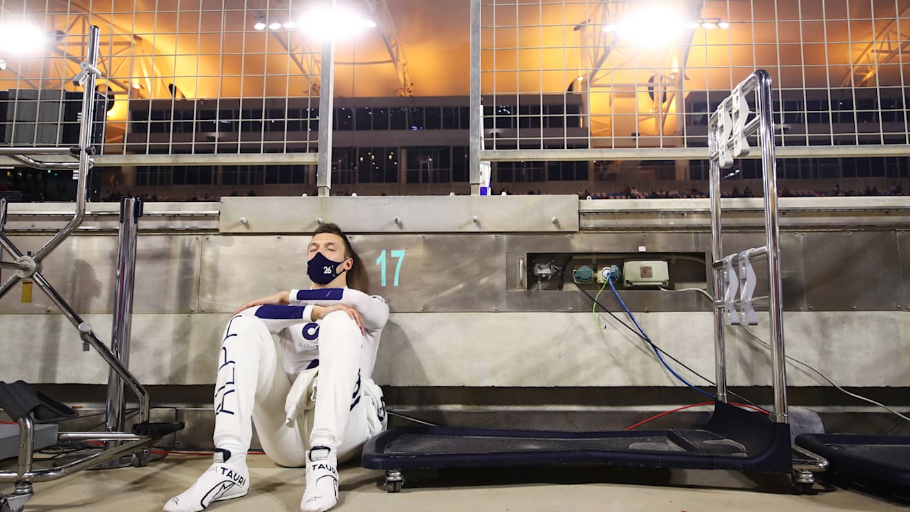 BAHRAIN, BAHRAIN - NOVEMBER 29: Daniil Kvyat of Russia and Scuderia AlphaTauri sits in the Pitlane following a red flag delay during the F1 Grand Prix of Bahrain at Bahrain International Circuit on November 29, 2020 in Bahrain, Bahrain. (Photo by Mark Thompson/Getty Images)