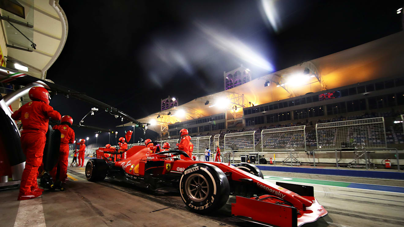 BAHRAIN, BAHRAIN - NOVEMBER 29: Sebastian Vettel of Germany driving the (5) Scuderia Ferrari SF1000 makes a pitstop during the F1 Grand Prix of Bahrain at Bahrain International Circuit on November 29, 2020 in Bahrain, Bahrain. (Photo by Mark Thompson/Getty Images)