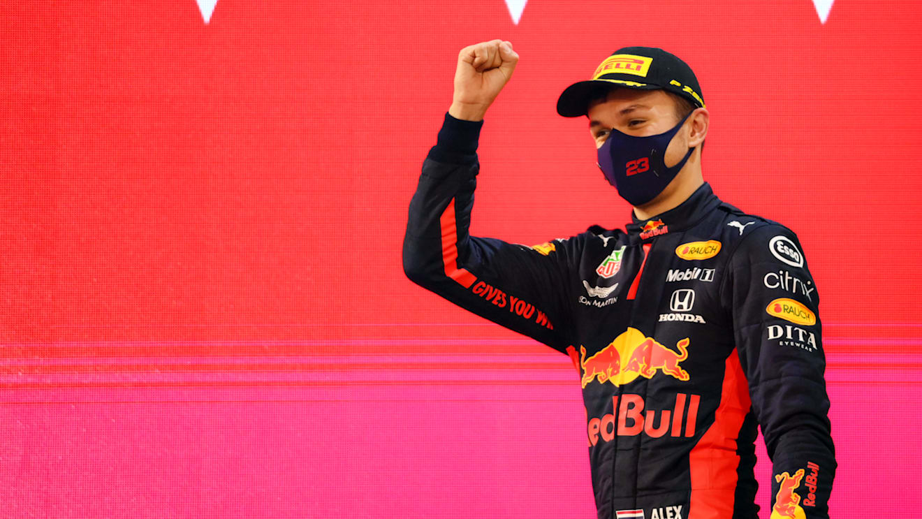 BAHRAIN, BAHRAIN - NOVEMBER 29: Third placed Alexander Albon of Thailand and Red Bull Racing celebrates on the podium during the F1 Grand Prix of Bahrain at Bahrain International Circuit on November 29, 2020 in Bahrain, Bahrain. (Photo by Clive Mason - Formula 1/Formula 1 via Getty Images)