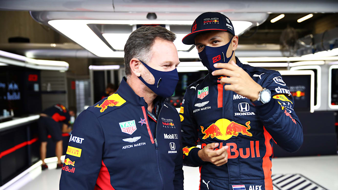 SPA, BELGIUM - AUGUST 29: Red Bull Racing Team Principal Christian Horner speaks with Alexander Albon of Thailand and Red Bull Racing in the garage during qualifying for the F1 Grand Prix of Belgium at Circuit de Spa-Francorchamps on August 29, 2020 in Spa, Belgium. (Photo by Mark Thompson/Getty Images)