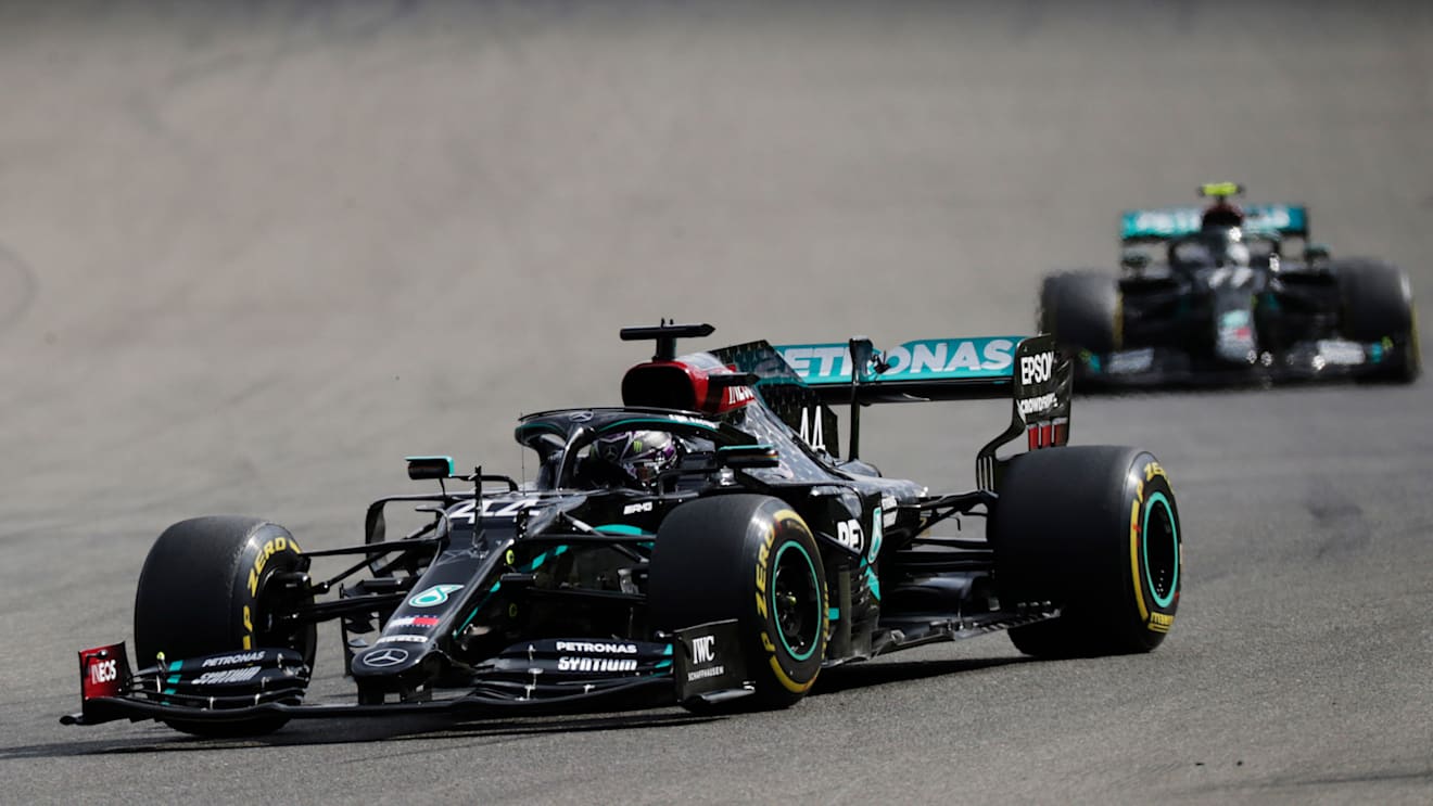 SPA, BELGIUM - AUGUST 30: Lewis Hamilton of Great Britain driving the (44) Mercedes AMG Petronas F1 Team Mercedes W11 leads Valtteri Bottas of Finland driving the (77) Mercedes AMG Petronas F1 Team Mercedes W11 during the F1 Grand Prix of Belgium at Circuit de Spa-Francorchamps on August 30, 2020 in Spa, Belgium. (Photo by Stephanie Lecocq/Pool via Getty Images)