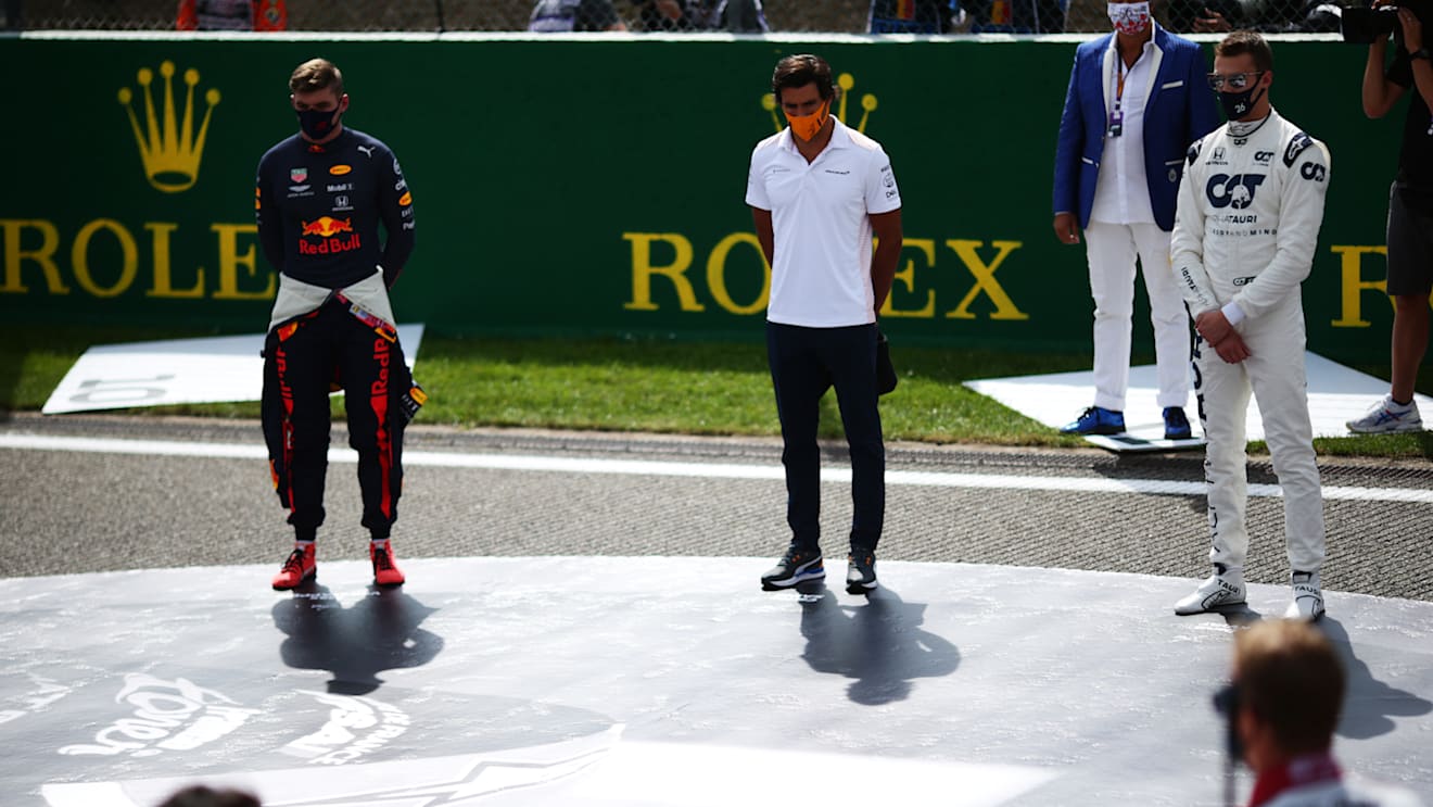 SPA, BELGIUM - AUGUST 30: Max Verstappen of Netherlands and Red Bull Racing, Carlos Sainz of Spain and McLaren F1 and Daniil Kvyat of Russia and Scuderia AlphaTauri take part in a minute of silence in tribute to the late Anthoine Hubert before the F1 Grand Prix of Belgium at Circuit de Spa-Francorchamps on August 30, 2020 in Spa, Belgium. (Photo by Peter Fox/Getty Images)