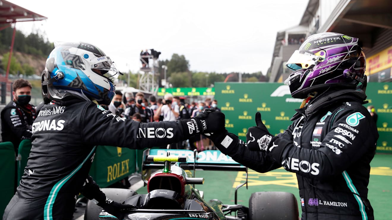 SPA, BELGIUM - AUGUST 30: Race winner Lewis Hamilton of Great Britain and Mercedes GP celebrates with teammate second placed Valtteri Bottas of Finland and Mercedes GP in parc ferme during the F1 Grand Prix of Belgium at Circuit de Spa-Francorchamps on August 30, 2020 in Spa, Belgium. (Photo by Stephanie Lecocq/Pool via Getty Images)