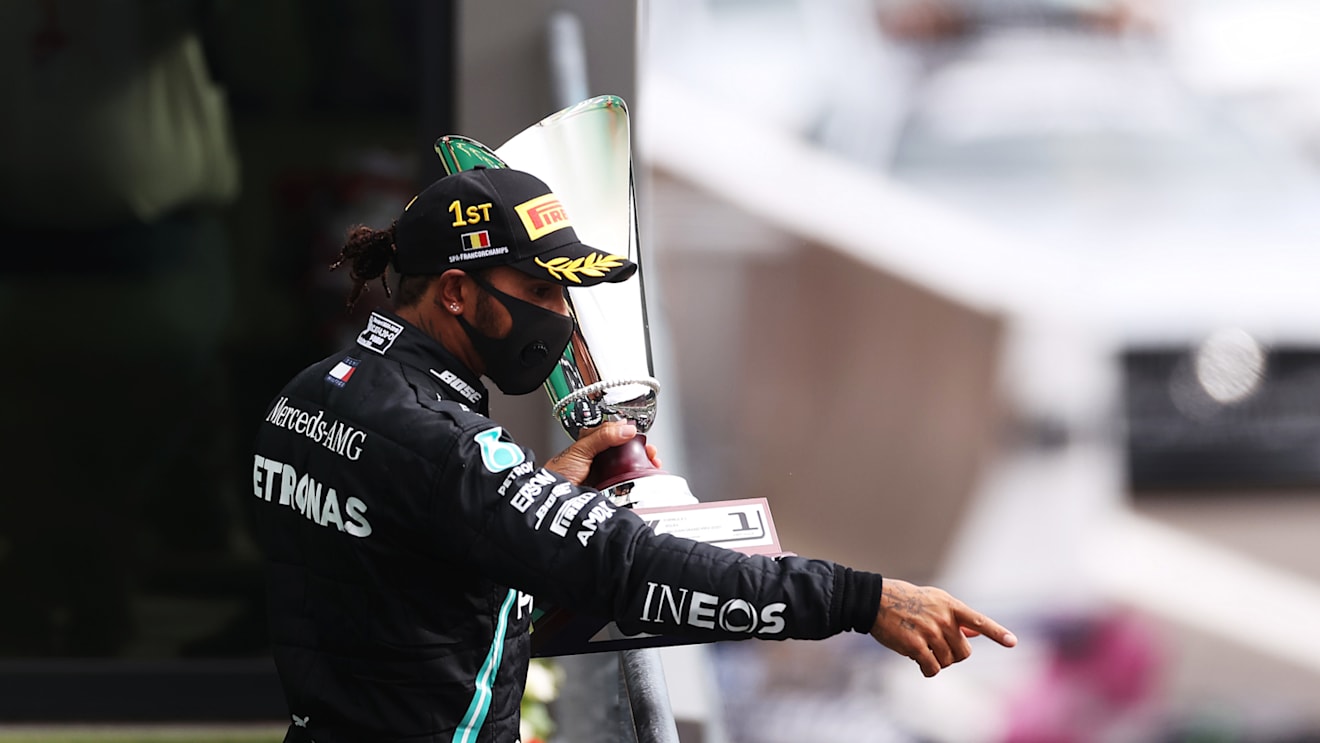SPA, BELGIUM - AUGUST 30: Race winner Lewis Hamilton of Great Britain and Mercedes GP celebrates on the podium during the F1 Grand Prix of Belgium at Circuit de Spa-Francorchamps on August 30, 2020 in Spa, Belgium. (Photo by Lars Baron/Getty Images)