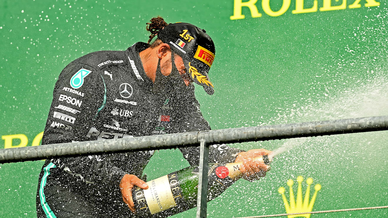 SPA, BELGIUM - AUGUST 30: Race winner Lewis Hamilton of Great Britain and Mercedes GP celebrates on the podium during the F1 Grand Prix of Belgium at Circuit de Spa-Francorchamps on August 30, 2020 in Spa, Belgium. (Photo by Clive Mason - Formula 1/Formula 1 via Getty Images)