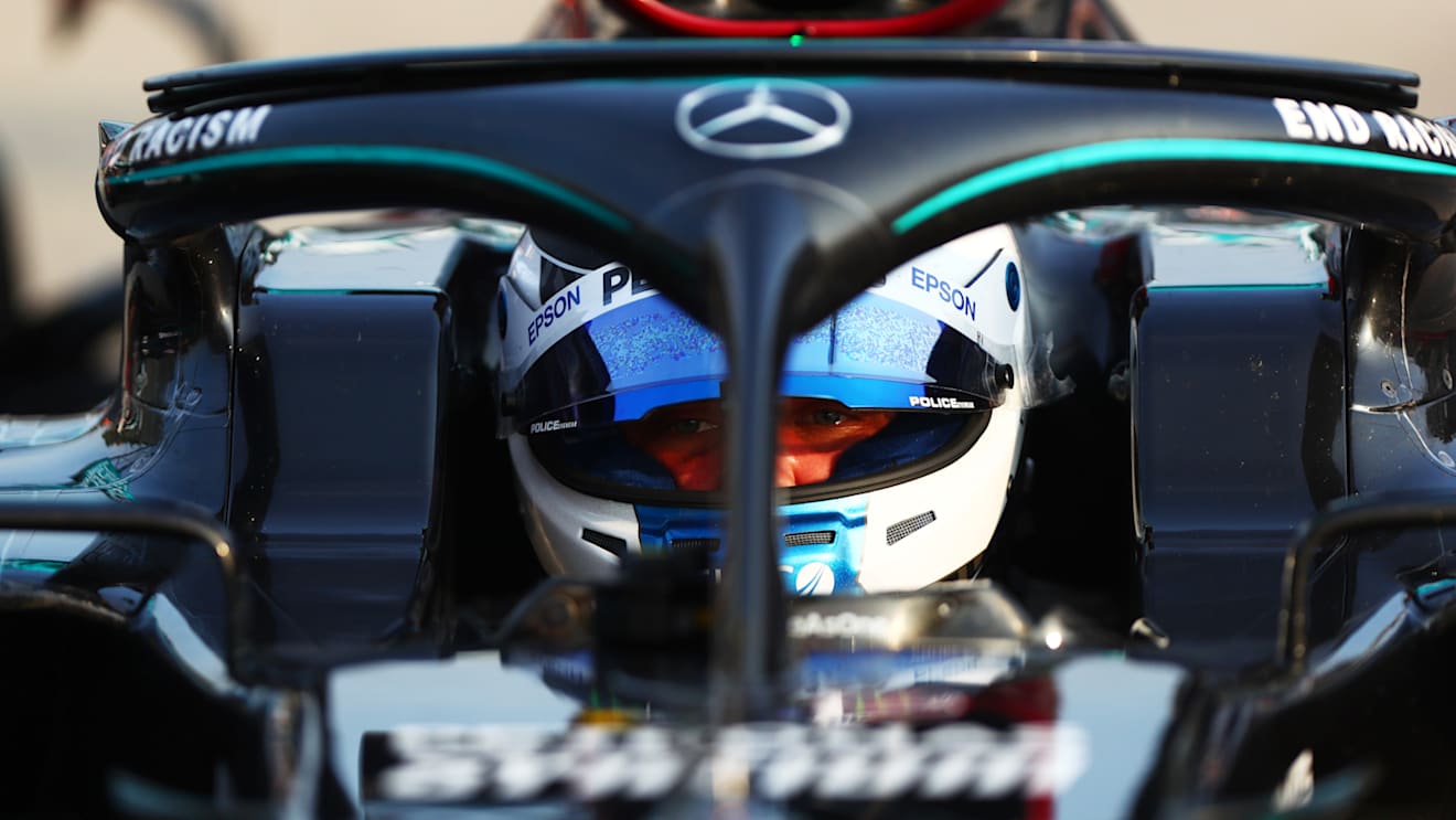 IMOLA, ITALY - OCTOBER 31: Pole position qualifier Valtteri Bottas of Finland and Mercedes GP looks on from his car as he arrives in parc ferme during qualifying ahead of the F1 Grand Prix of Emilia Romagna at Autodromo Enzo e Dino Ferrari on October 31, 2020 in Imola, Italy. (Photo by Dan Istitene - Formula 1/Formula 1 via Getty Images)