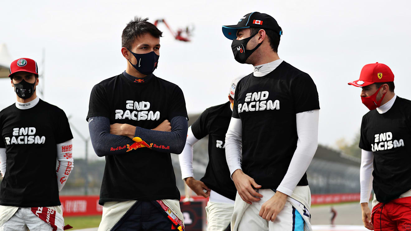 IMOLA, ITALY - NOVEMBER 01: Alexander Albon of Thailand and Red Bull Racing and Nicholas Latifi of Canada and Williams talk on the grid before the F1 Grand Prix of Emilia Romagna at Autodromo Enzo e Dino Ferrari on November 01, 2020 in Imola, Italy. (Photo by Lars Baron - Formula 1/Formula 1 via Getty Images)
