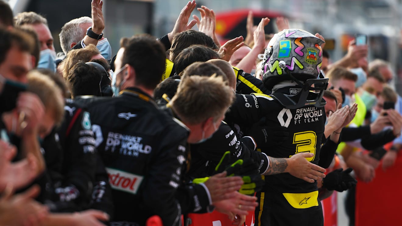 IMOLA, ITALY - NOVEMBER 01: Third placed Daniel Ricciardo of Australia and Renault Sport F1 celebrates with team members in parc ferme during the F1 Grand Prix of Emilia Romagna at Autodromo Enzo e Dino Ferrari on November 01, 2020 in Imola, Italy. (Photo by Rudy Carezzevoli/Getty Images)