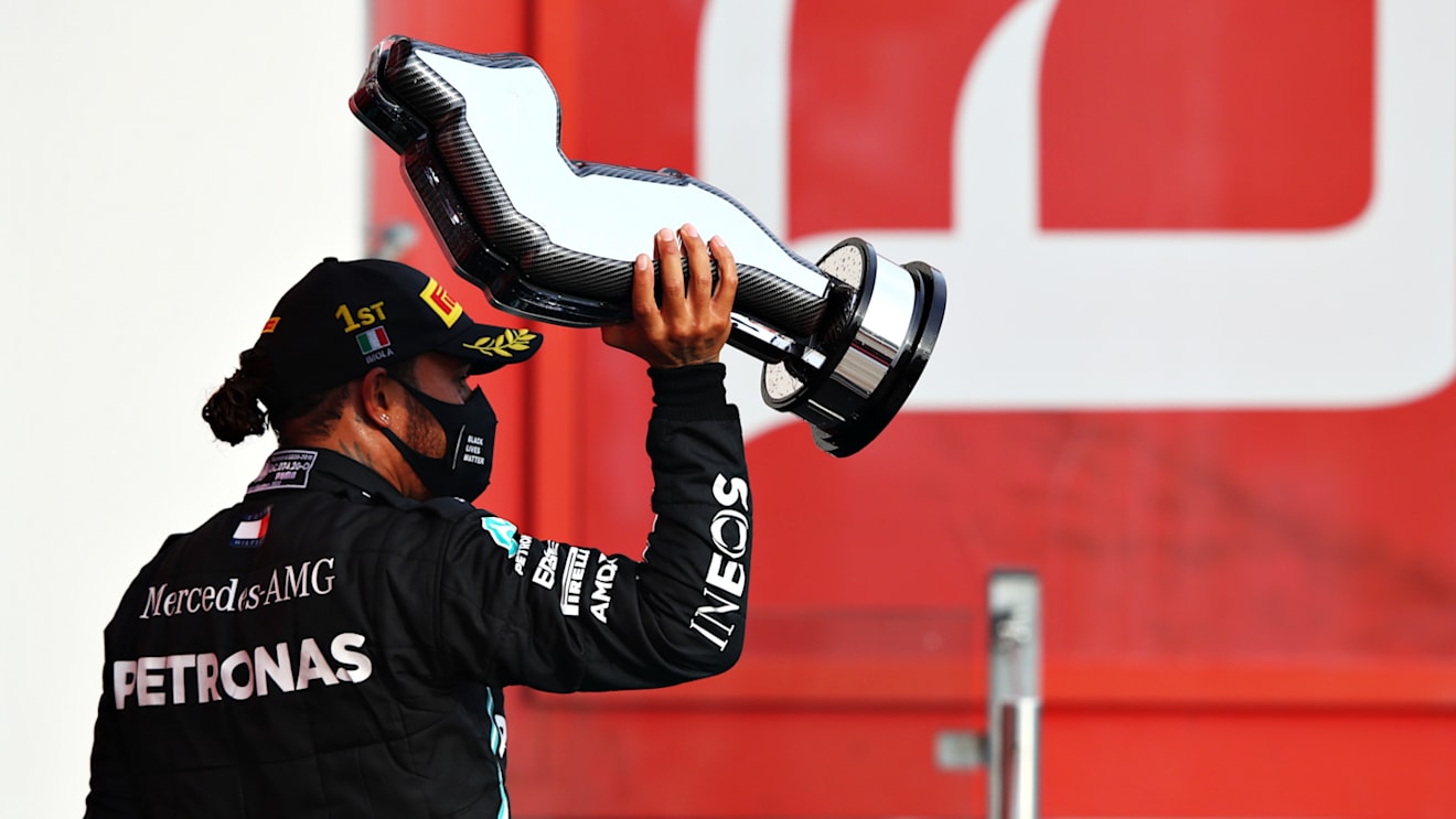 IMOLA, ITALY - NOVEMBER 01: Race winner Lewis Hamilton of Great Britain and Mercedes GP celebrates on the podium during the F1 Grand Prix of Emilia Romagna at Autodromo Enzo e Dino Ferrari on November 01, 2020 in Imola, Italy. (Photo by Mark Thompson/Getty Images)