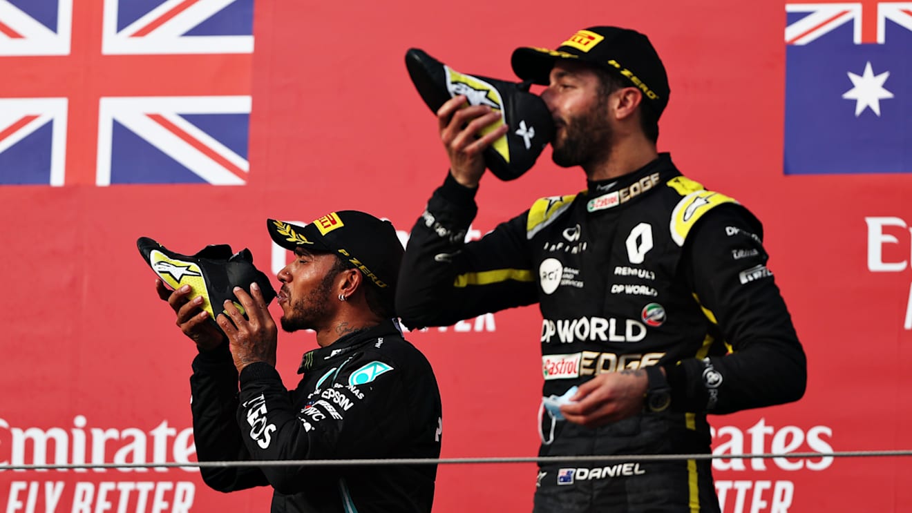 IMOLA, ITALY - NOVEMBER 01: Race winner Lewis Hamilton of Great Britain and Mercedes GP and third placed Daniel Ricciardo of Australia and Renault Sport F1 celebrate on the podium during the F1 Grand Prix of Emilia Romagna at Autodromo Enzo e Dino Ferrari on November 01, 2020 in Imola, Italy. (Photo by Lars Baron - Formula 1/Formula 1 via Getty Images)