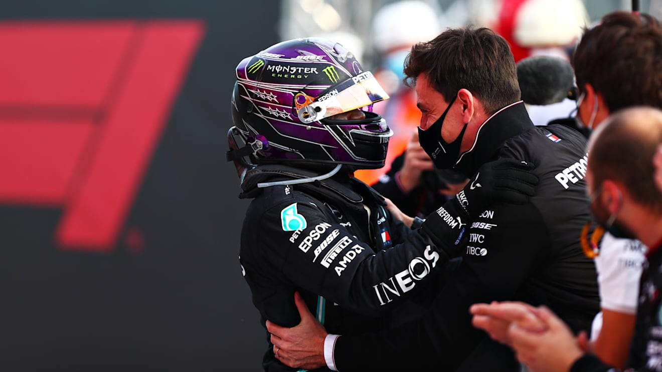 IMOLA, ITALY - NOVEMBER 01: Race winner Lewis Hamilton of Great Britain and Mercedes GP celebrates the 7th consecutive F1 Constructors Championship with Mercedes GP Executive Director Toto Wolff in parc ferme during the F1 Grand Prix of Emilia Romagna at Autodromo Enzo e Dino Ferrari on November 01, 2020 in Imola, Italy. (Photo by Dan Istitene - Formula 1/Formula 1 via Getty Images)