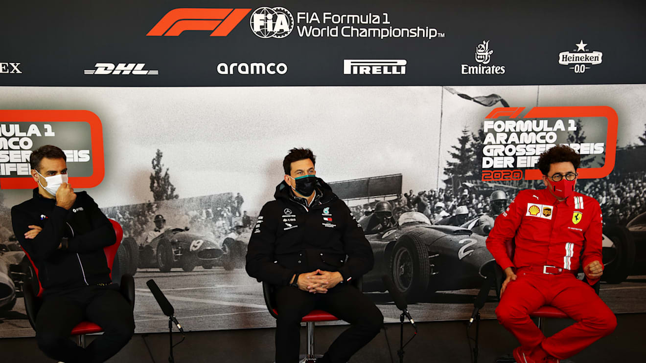 NUERBURG, GERMANY - OCTOBER 09: (L-R) Renault Sport F1 Managing Director Cyril Abiteboul, Mercedes GP Executive Director Toto Wolff and Scuderia Ferrari Team Principal Mattia Binotto talk in the Team Principals Press Conference during practice ahead of the F1 Eifel Grand Prix at Nuerburgring on October 09, 2020 in Nuerburg, Germany. (Photo by Joe Portlock/Getty Images)