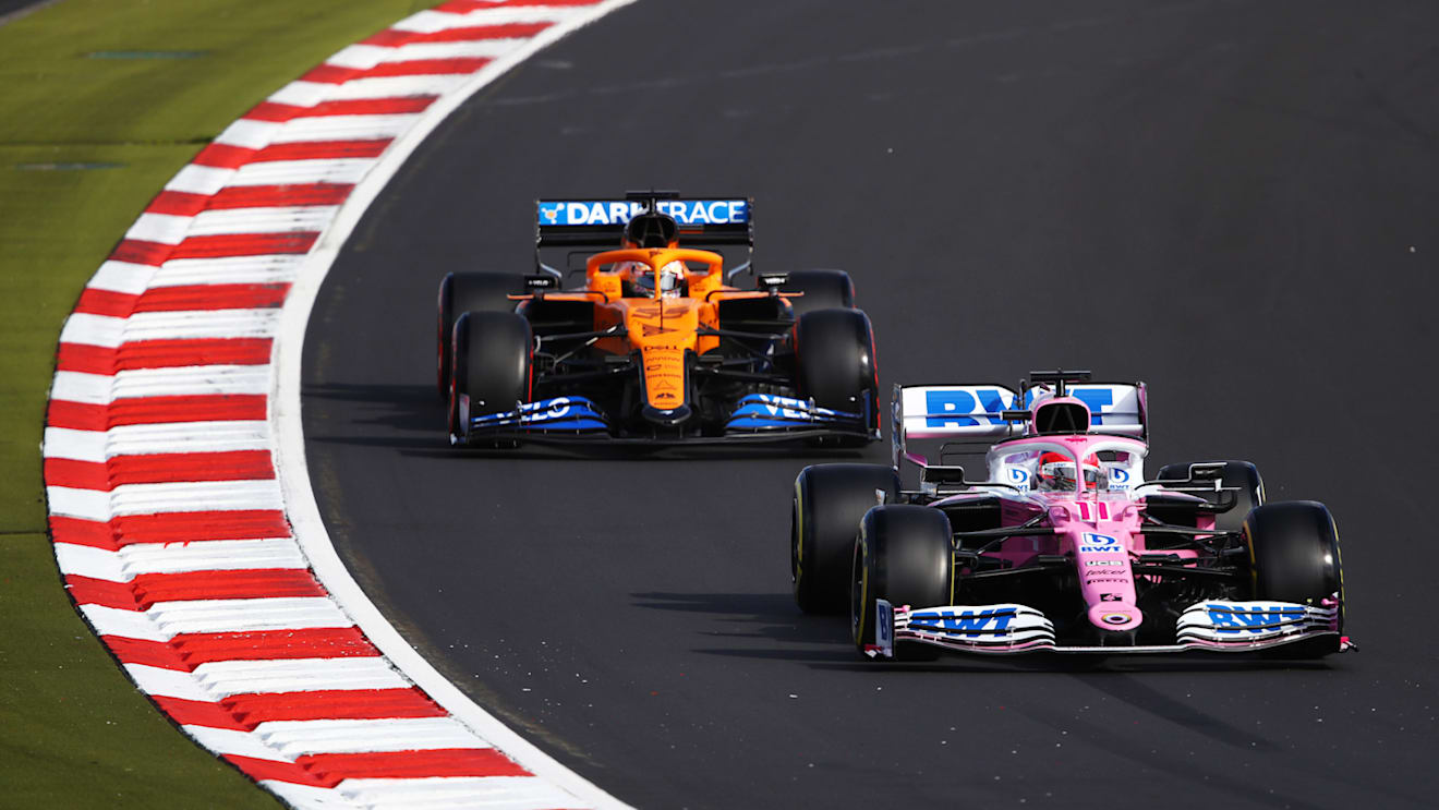 NUERBURG, GERMANY - OCTOBER 10: Sergio Perez of Mexico driving the (11) Racing Point RP20 Mercedes leads Carlos Sainz of Spain driving the (55) McLaren F1 Team MCL35 Renault during qualifying ahead of the F1 Eifel Grand Prix at Nuerburgring on October 10, 2020 in Nuerburg, Germany. (Photo by Bryn Lennon/Getty Images)