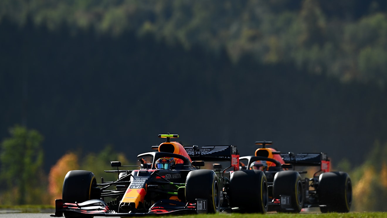 NUERBURG, GERMANY - OCTOBER 10: Alexander Albon of Thailand driving the (23) Aston Martin Red Bull Racing RB16 leads Max Verstappen of the Netherlands driving the (33) Aston Martin Red Bull Racing RB16 during final practice ahead of the F1 Eifel Grand Prix at Nuerburgring on October 10, 2020 in Nuerburg, Germany. (Photo by Clive Mason - Formula 1/Formula 1 via Getty Images)
