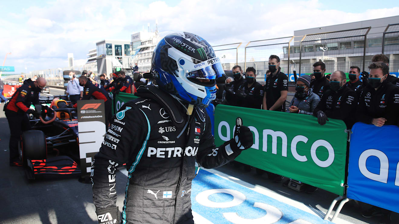 NUERBURG, GERMANY - OCTOBER 10: Pole position qualifier Valtteri Bottas of Finland and Mercedes GP celebrates in parc ferme during qualifying ahead of the F1 Eifel Grand Prix at Nuerburgring on October 10, 2020 in Nuerburg, Germany. (Photo by Wolfgang Rattay - Pool/Getty Images)