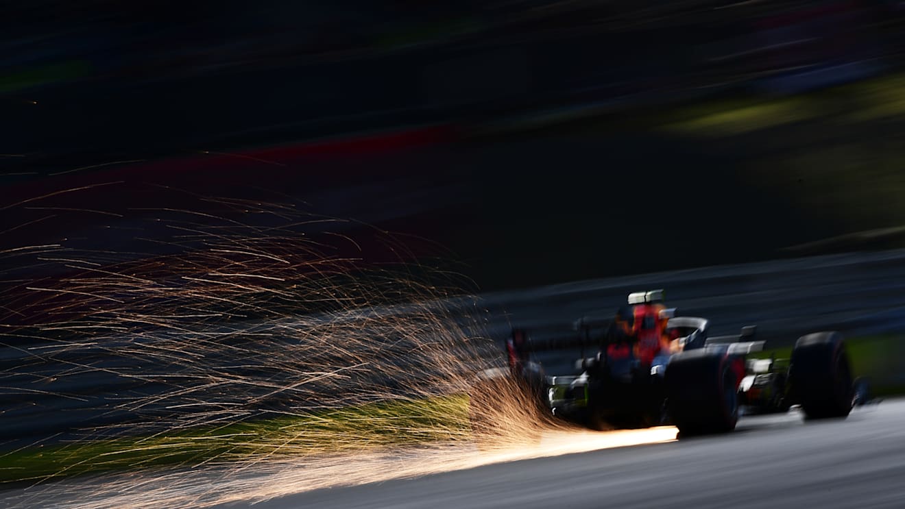 NUERBURG, GERMANY - OCTOBER 10: Sparks fly behind Max Verstappen of the Netherlands driving the (33) Aston Martin Red Bull Racing RB16 during qualifying ahead of the F1 Eifel Grand Prix at Nuerburgring on October 10, 2020 in Nuerburg, Germany. (Photo by Mario Renzi - Formula 1/Formula 1 via Getty Images)