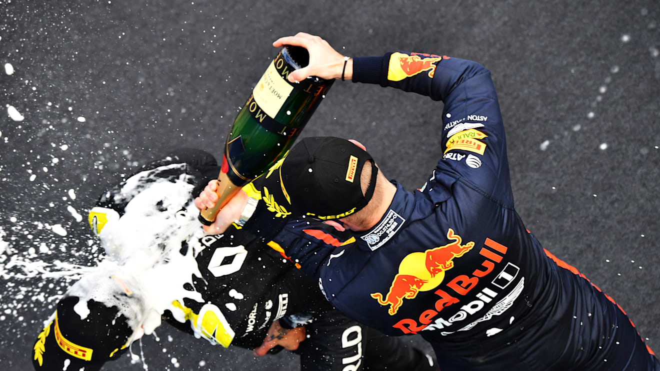 NUERBURG, GERMANY - OCTOBER 11: Daniel Ricciardo of Renault and Second placed Max Verstappen of Netherlands and Red Bull Racing celebrate on the podium during the F1 Eifel Grand Prix at Nuerburgring on October 11, 2020 in Nuerburg, Germany. (Photo by Getty Images/Getty Images)