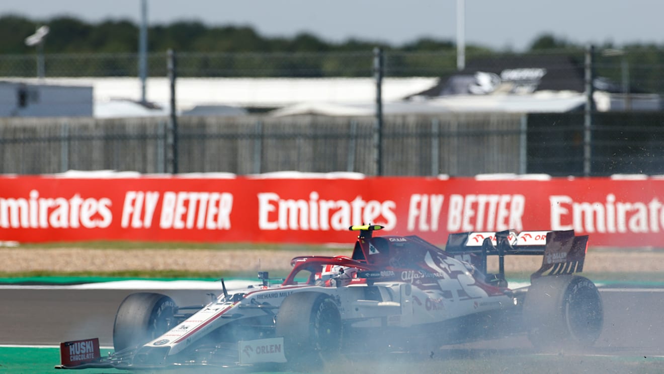 NORTHAMPTON, ENGLAND - JULY 31: Antonio Giovinazzi of Italy driving the (99) Alfa Romeo Racing C39 Ferrari spins on track during practice for the F1 Grand Prix of Great Britain at Silverstone on July 31, 2020 in Northampton, England. (Photo by Andrew Boyers/Pool via Getty Image)
