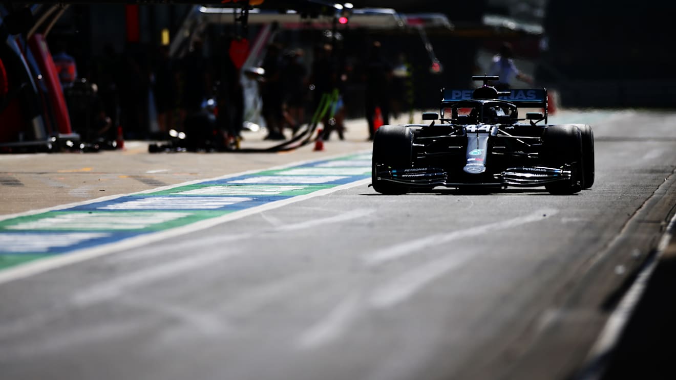NORTHAMPTON, ENGLAND - JULY 31: Lewis Hamilton of Great Britain driving the (44) Mercedes AMG Petronas F1 Team Mercedes W11 in the Pitlane during practice for the F1 Grand Prix of Great Britain at Silverstone on July 31, 2020 in Northampton, England. (Photo by Peter Fox/Getty Images)
