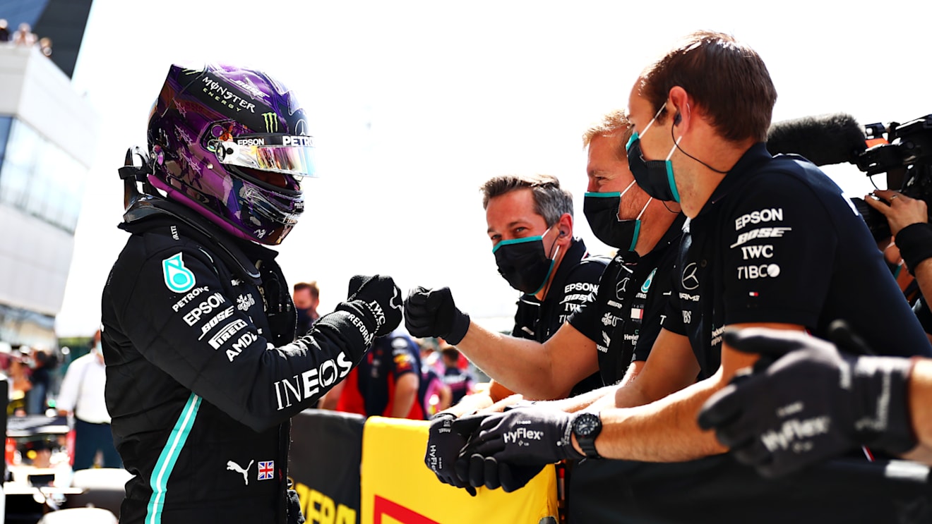 NORTHAMPTON, ENGLAND - AUGUST 01: Pole position qualifier Lewis Hamilton of Great Britain and Mercedes GP celebrates in parc ferme during qualifying for the F1 Grand Prix of Great Britain at Silverstone on August 01, 2020 in Northampton, England. (Photo by Dan Istitene - Formula 1/Formula 1 via Getty Images)