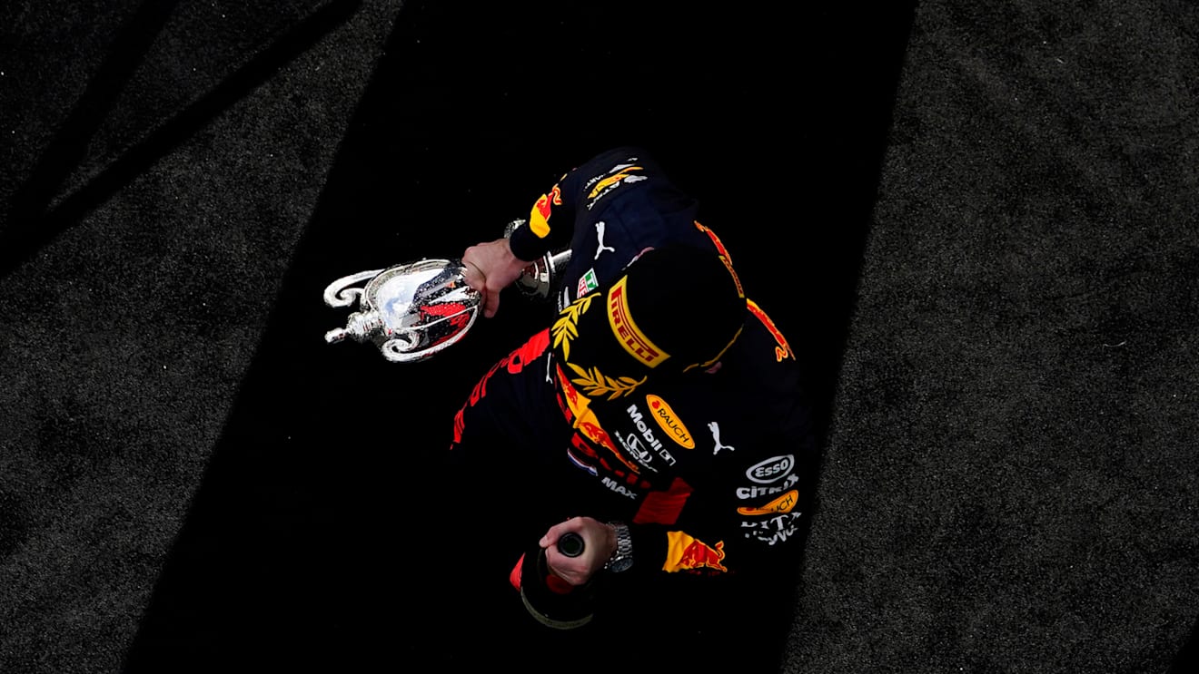 NORTHAMPTON, ENGLAND - AUGUST 02: Runner-up Max Verstappen of Netherlands and Red Bull Racing celebrates on the podium during the F1 Grand Prix of Great Britain at Silverstone on August 02, 2020 in Northampton, England. (Photo by Will Oliver/Pool via Getty Images)