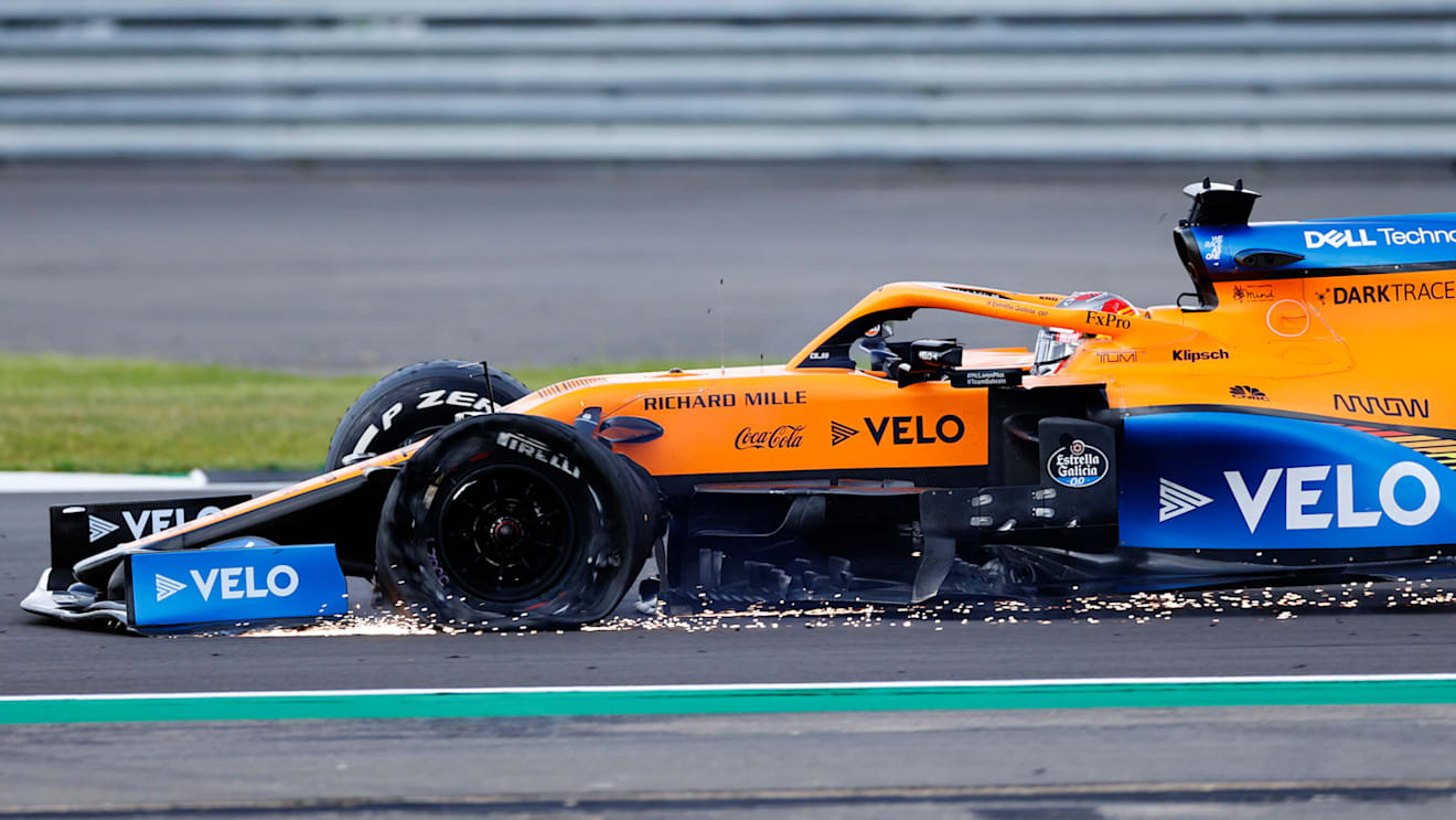 NORTHAMPTON, ENGLAND - AUGUST 02: Carlos Sainz of Spain driving the (55) McLaren F1 Team MCL35 Renault on track with a punctured tyre during the F1 Grand Prix of Great Britain at Silverstone on August 02, 2020 in Northampton, England. (Photo by Andrew Boyers/Pool via Getty Images)
