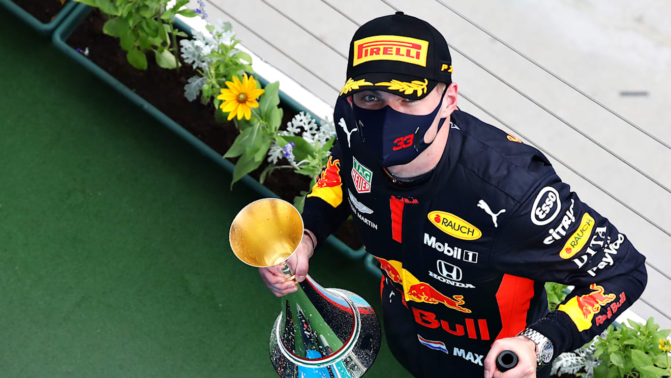 BUDAPEST, HUNGARY - JULY 19: Second placed Max Verstappen of Netherlands and Red Bull Racing celebrates on the podium during the Formula One Grand Prix of Hungary at Hungaroring on July 19, 2020 in Budapest, Hungary. (Photo by Mark Thompson/Getty Images)