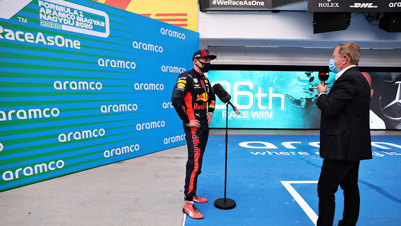 BUDAPEST, HUNGARY - JULY 19: Second placed Max Verstappen of Netherlands and Red Bull Racing talks to the media in parc ferme during the Formula One Grand Prix of Hungary at Hungaroring on July 19, 2020 in Budapest, Hungary. (Photo by Getty Images/Getty Images)