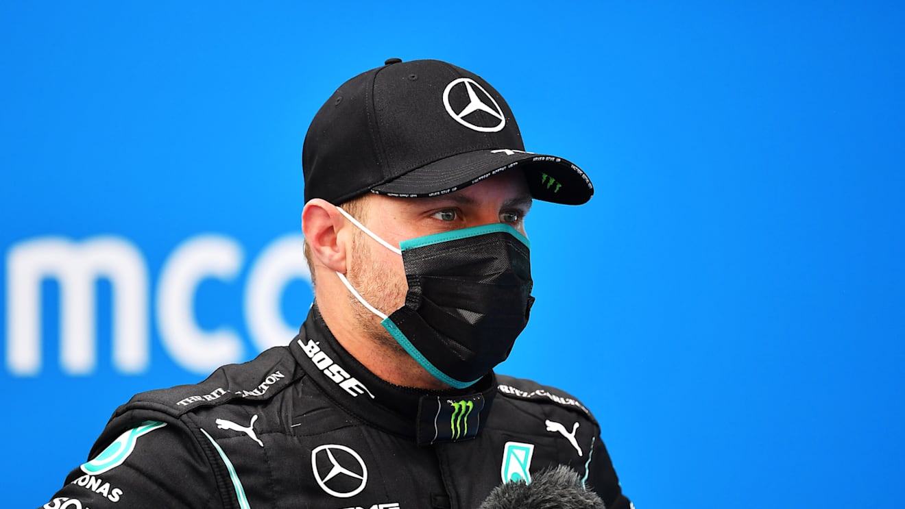 BUDAPEST, HUNGARY - JULY 19: Third placed Valtteri Bottas of Finland and Mercedes GP is interviewed in parc ferme after the Formula One Grand Prix of Hungary at Hungaroring on July 19, 2020 in Budapest, Hungary. (Photo by Joe Klamar/Pool via Getty Images)
