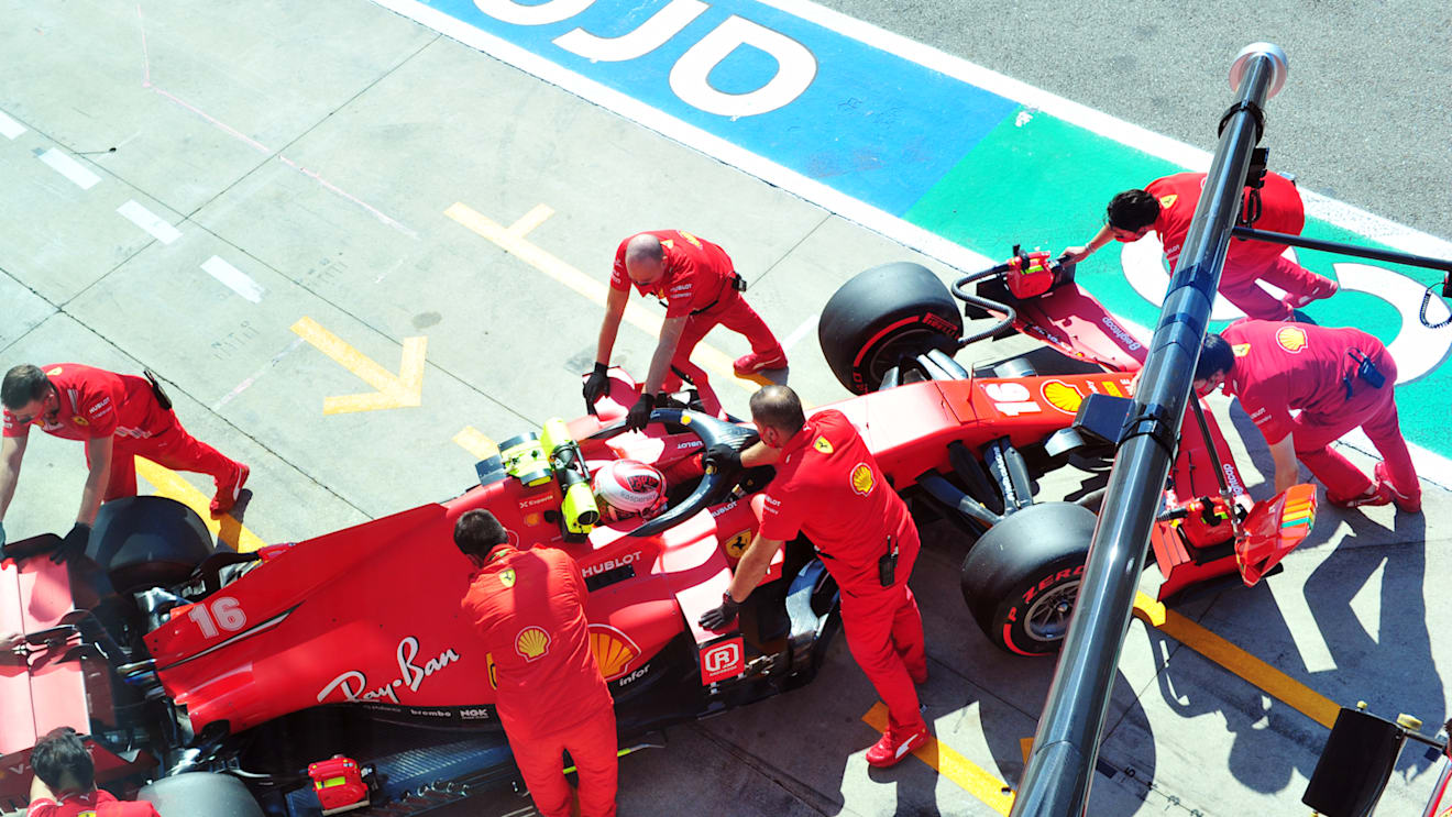 MONZA, ITALY - SEPTEMBER 05: Charles Leclerc of Monaco driving the (16) Scuderia Ferrari SF1000 is pushed back into the garage during qualifying for the F1 Grand Prix of Italy at Autodromo di Monza on September 05, 2020 in Monza, Italy. (Photo by Jenifer Lorenzini - Pool/Getty Images)