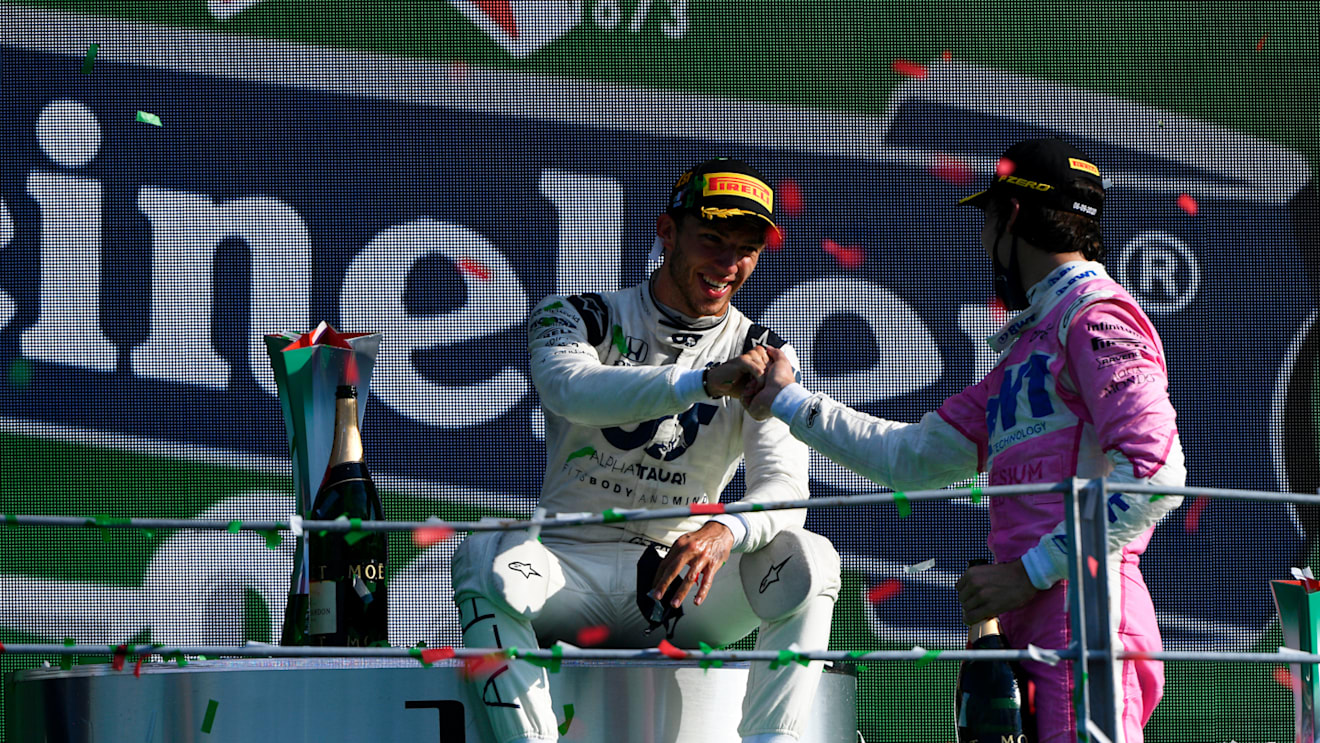 MONZA, ITALY - SEPTEMBER 06: Race winner Pierre Gasly of France and Scuderia AlphaTauri is congratulated by third placed Lance Stroll of Canada and Racing Point during the F1 Grand Prix of Italy at Autodromo di Monza on September 06, 2020 in Monza, Italy. (Photo by Rudy Carezzevoli/Getty Images)