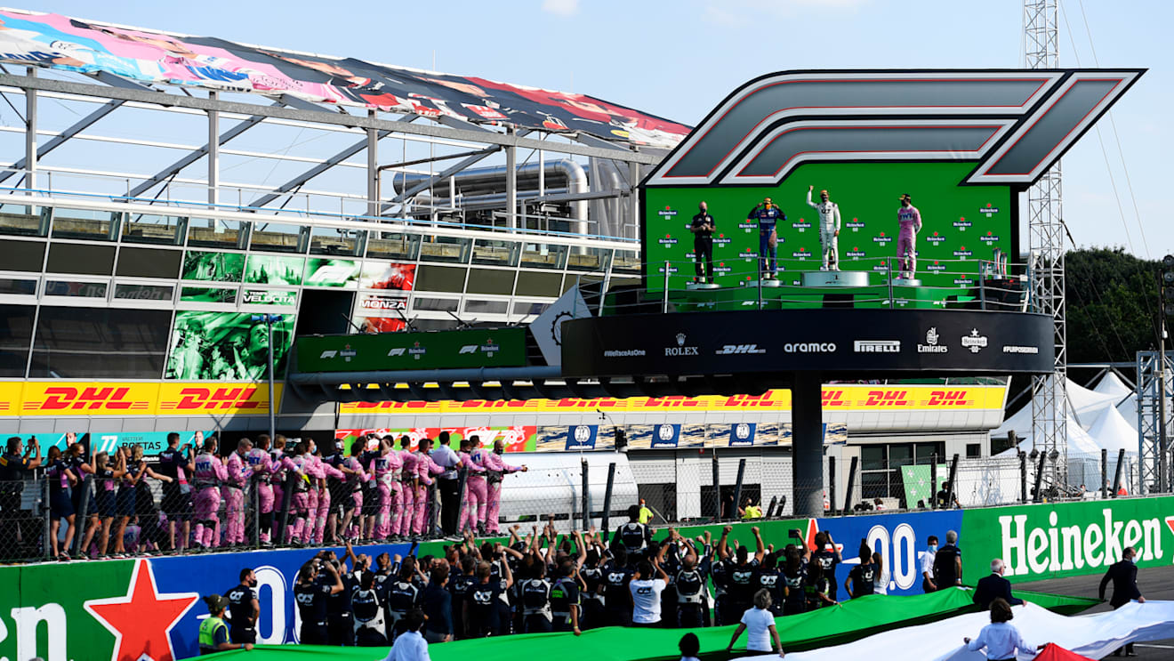 MONZA, ITALY - SEPTEMBER 06: Race winner Pierre Gasly of France and Scuderia AlphaTauri, second placed Carlos Sainz of Spain and McLaren F1 and third placed Lance Stroll of Canada and Racing Point celebrate on the podium during the F1 Grand Prix of Italy at Autodromo di Monza on September 06, 2020 in Monza, Italy. (Photo by Rudy Carezzevoli/Getty Images)