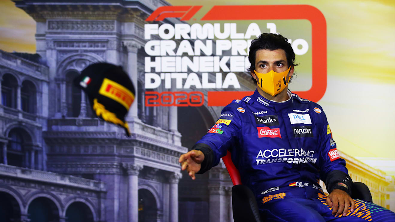 MONZA, ITALY - SEPTEMBER 06: Second placed Carlos Sainz of Spain and McLaren F1 changes his hat in the Drivers Press Conference after the F1 Grand Prix of Italy at Autodromo di Monza on September 06, 2020 in Monza, Italy. (Photo by Mark Thompson/Getty Images)