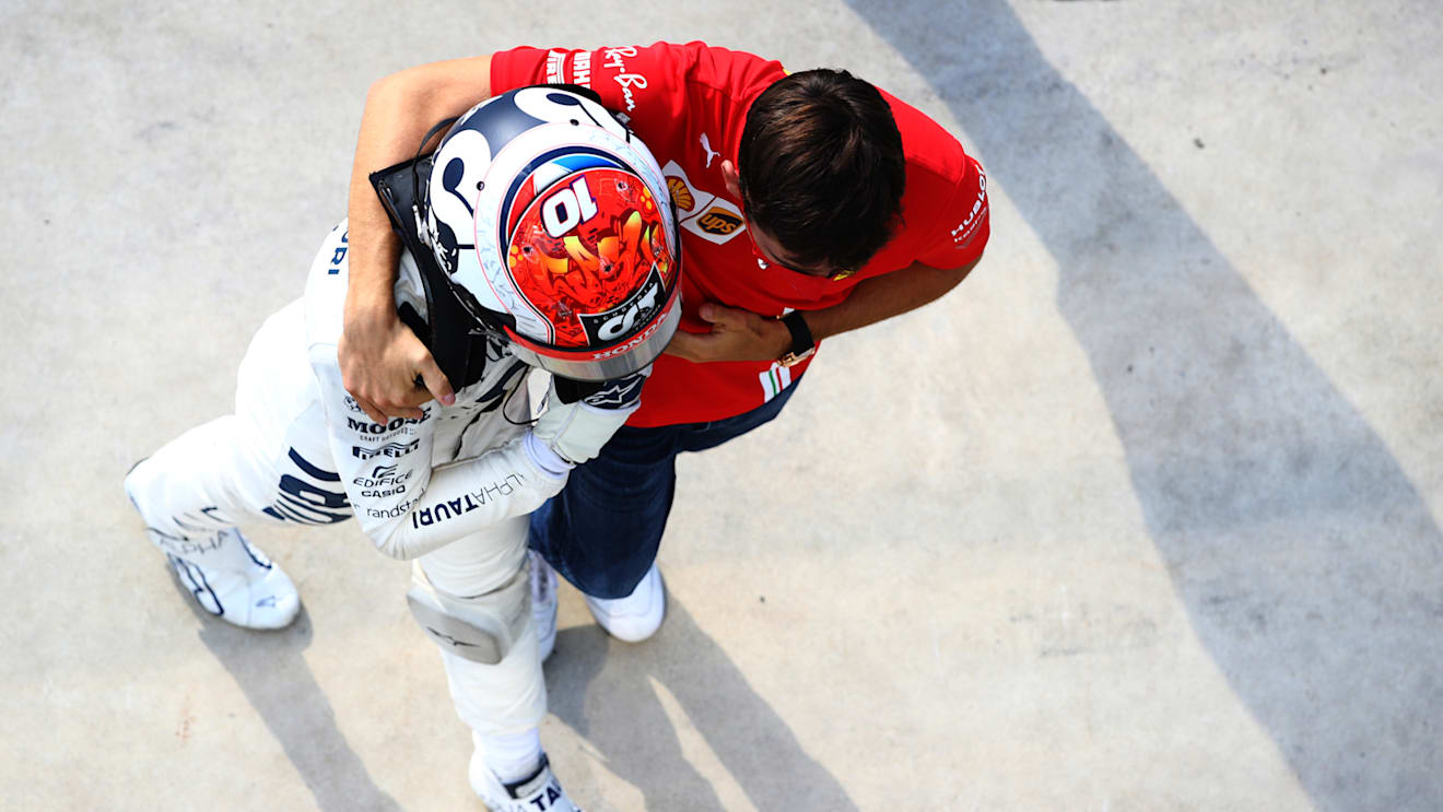MONZA, ITALY - SEPTEMBER 06: Race winner Pierre Gasly of France and Scuderia AlphaTauri celebrates with Charles Leclerc of Monaco and Ferrari in parc ferme during the F1 Grand Prix of Italy at Autodromo di Monza on September 06, 2020 in Monza, Italy. (Photo by Mark Thompson/Getty Images)