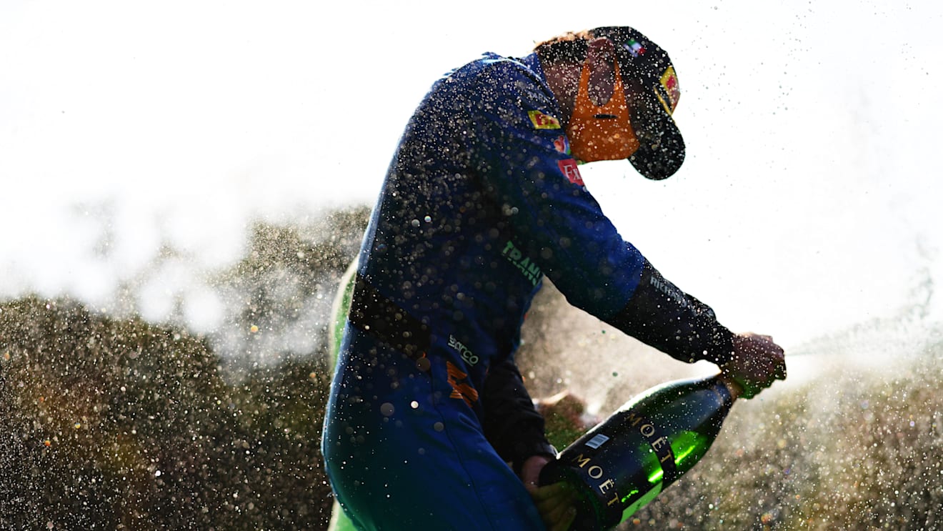 MONZA, ITALY - SEPTEMBER 06: Second placed Carlos Sainz of Spain and McLaren F1 celebrates on the podium during the F1 Grand Prix of Italy at Autodromo di Monza on September 06, 2020 in Monza, Italy. (Photo by Mario Renzi - Formula 1/Formula 1 via Getty Images)