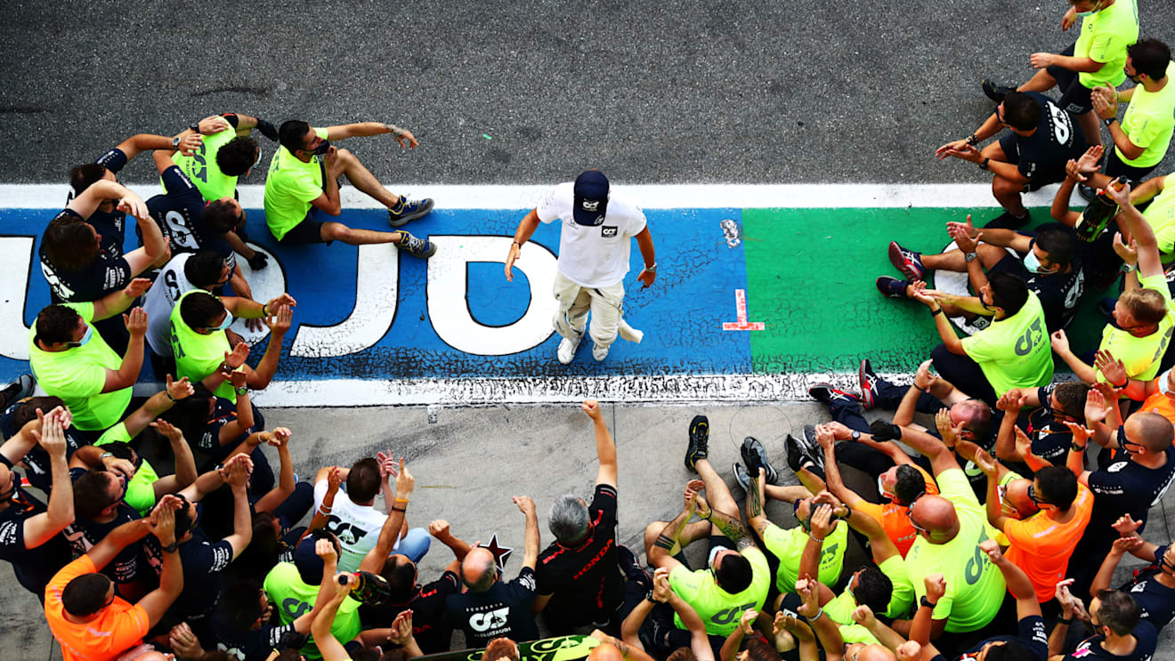 MONZA, ITALY - SEPTEMBER 06: Race winner Pierre Gasly of France and Scuderia AlphaTauri and teammate Daniil Kvyat of Russia and Scuderia AlphaTauri celebrate with team members during the F1 Grand Prix of Italy at Autodromo di Monza on September 06, 2020 in Monza, Italy. (Photo by Dan Istitene - Formula 1/Formula 1 via Getty Images)