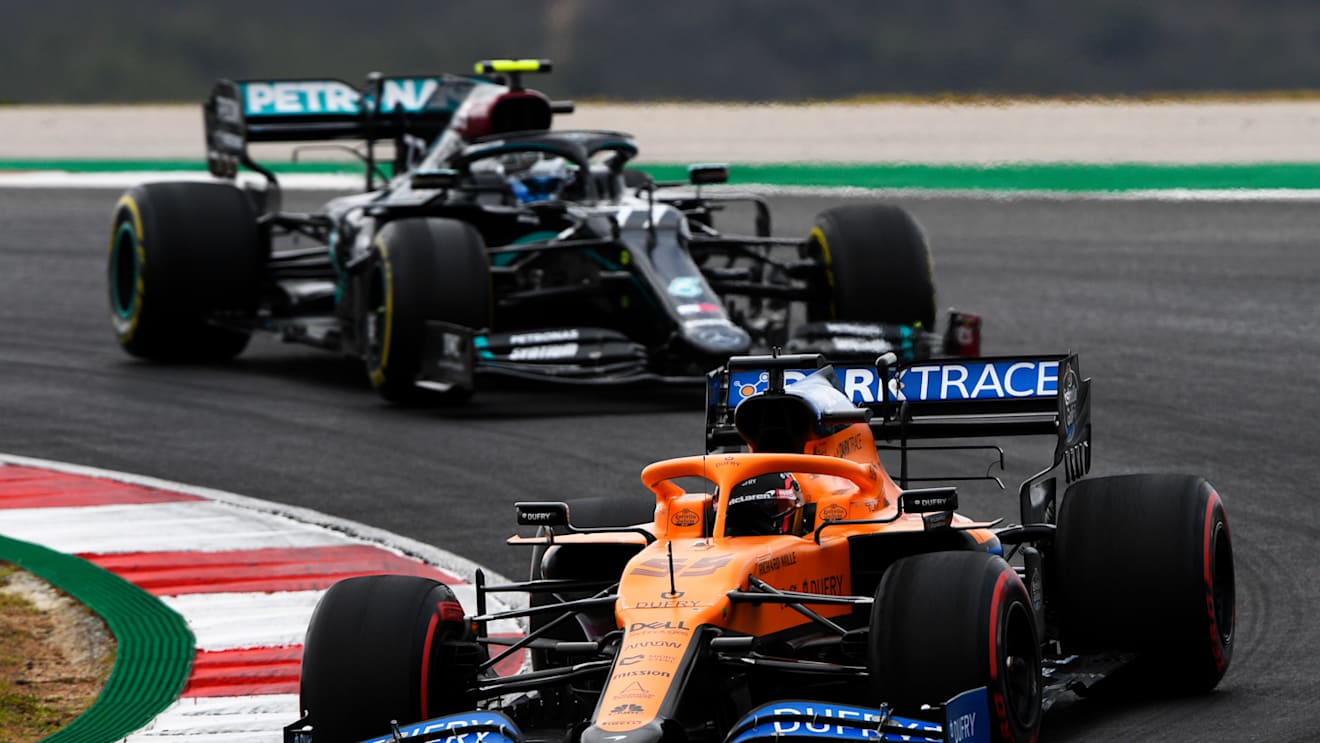 PORTIMAO, PORTUGAL - OCTOBER 25: Carlos Sainz of Spain driving the (55) McLaren F1 Team MCL35 Renault leads Valtteri Bottas of Finland driving the (77) Mercedes AMG Petronas F1 Team Mercedes W11 on track during the F1 Grand Prix of Portugal at Autodromo Internacional do Algarve on October 25, 2020 in Portimao, Portugal. (Photo by Rudy Carezzevoli/Getty Images)