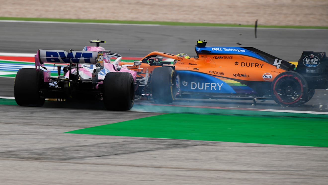 PORTIMAO, PORTUGAL - OCTOBER 25: Lance Stroll of Canada driving the (18) Racing Point RP20 Mercedes clashes with Lando Norris of Great Britain driving the (4) McLaren F1 Team MCL35 Renault during the F1 Grand Prix of Portugal at Autodromo Internacional do Algarve on October 25, 2020 in Portimao, Portugal. (Photo by Jorge Guerrero - Pool/Getty Images)
