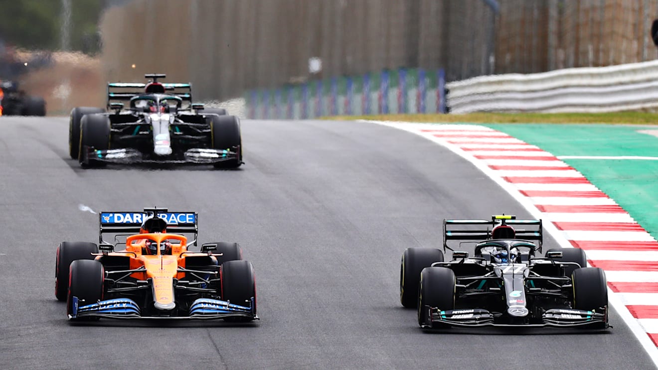 PORTIMAO, PORTUGAL - OCTOBER 25: Valtteri Bottas of Finland driving the (77) Mercedes AMG Petronas F1 Team Mercedes W11 leads Carlos Sainz of Spain driving the (55) McLaren F1 Team MCL35 Renault during the F1 Grand Prix of Portugal at Autodromo Internacional do Algarve on October 25, 2020 in Portimao, Portugal. (Photo by Dan Istitene - Formula 1/Formula 1 via Getty Images)