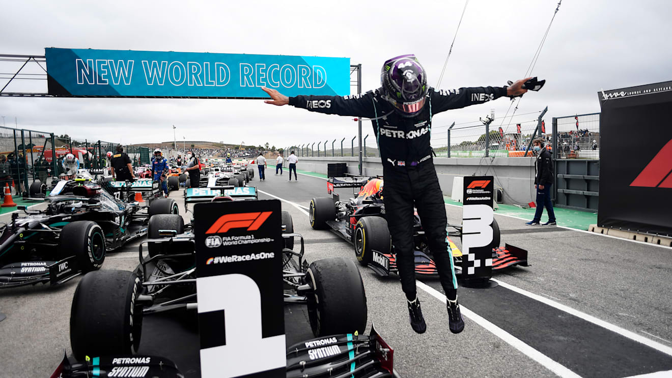 PORTIMAO, PORTUGAL - OCTOBER 25: Race winner Lewis Hamilton of Great Britain and Mercedes GP celebrates his record breaking 92nd race win in parc ferme during the F1 Grand Prix of Portugal at Autodromo Internacional do Algarve on October 25, 2020 in Portimao, Portugal. (Photo by Jorge Guerrero - Pool/Getty Images)