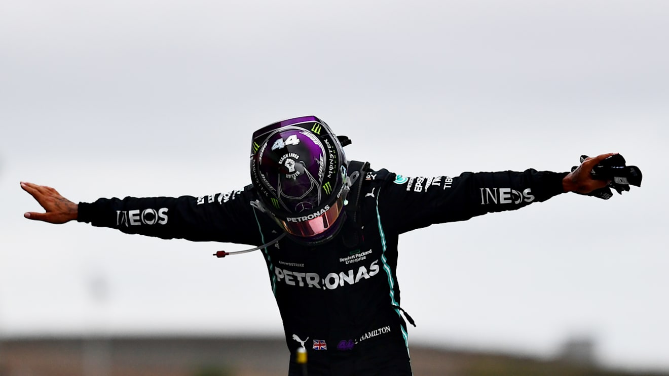PORTIMAO, PORTUGAL - OCTOBER 25: Race winner Lewis Hamilton of Great Britain and Mercedes GP celebrates his record breaking 92nd race win in parc ferme during the F1 Grand Prix of Portugal at Autodromo Internacional do Algarve on October 25, 2020 in Portimao, Portugal. (Photo by Mario Renzi - Formula 1/Formula 1 via Getty Images)
