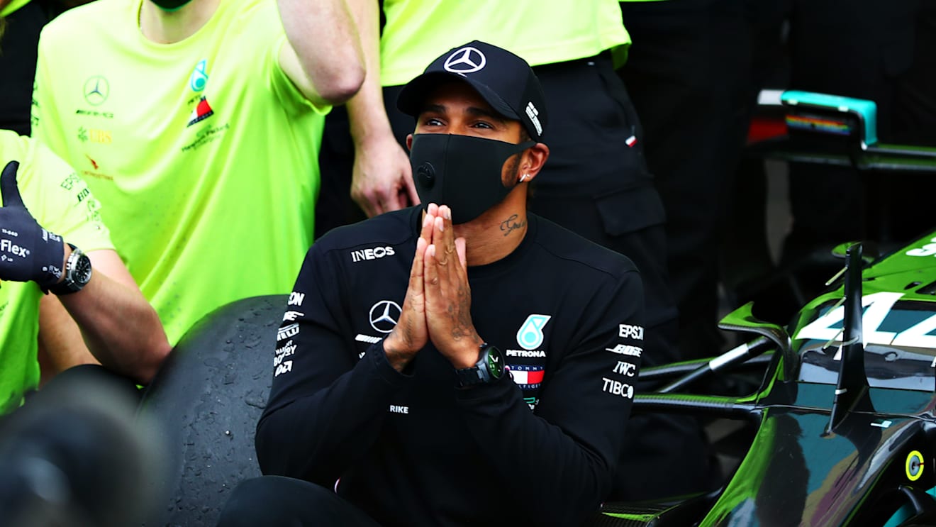 PORTIMAO, PORTUGAL - OCTOBER 25: Race winner Lewis Hamilton of Great Britain and Mercedes GP celebrates his record breaking 92nd race win after the F1 Grand Prix of Portugal at Autodromo Internacional do Algarve on October 25, 2020 in Portimao, Portugal. (Photo by Dan Istitene - Formula 1/Formula 1 via Getty Images)