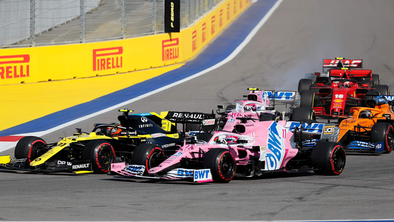 SOCHI, RUSSIA - SEPTEMBER 27: Esteban Ocon of France driving the (31) Renault Sport Formula One Team RS20 and Sergio Perez of Mexico driving the (11) Racing Point RP20 Mercedes on track during the F1 Grand Prix of Russia at Sochi Autodrom on September 27, 2020 in Sochi, Russia. (Photo by Yuri Kochetkov - Pool/Getty Images)