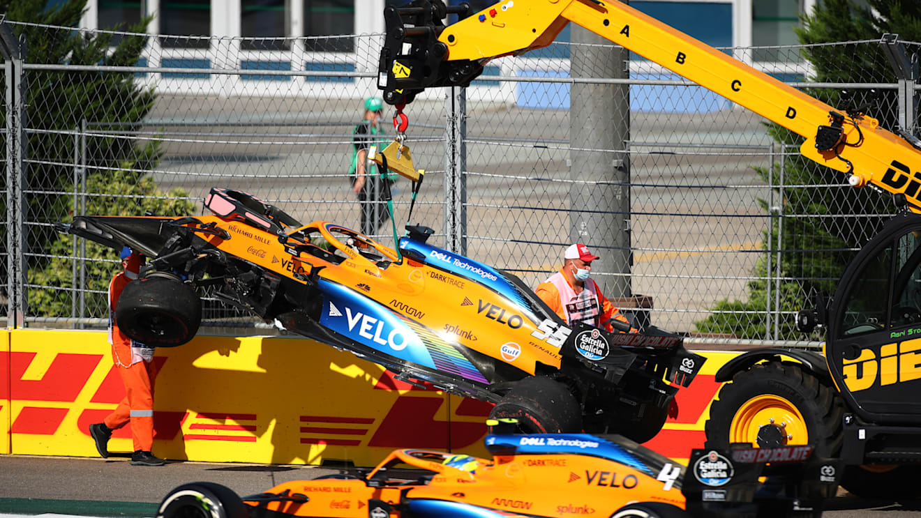 SOCHI, RUSSIA - SEPTEMBER 27: The car of Carlos Sainz of Spain and McLaren F1 is removed from the track after crashing on the first lap during the F1 Grand Prix of Russia at Sochi Autodrom on September 27, 2020 in Sochi, Russia. (Photo by Bryn Lennon/Getty Images)