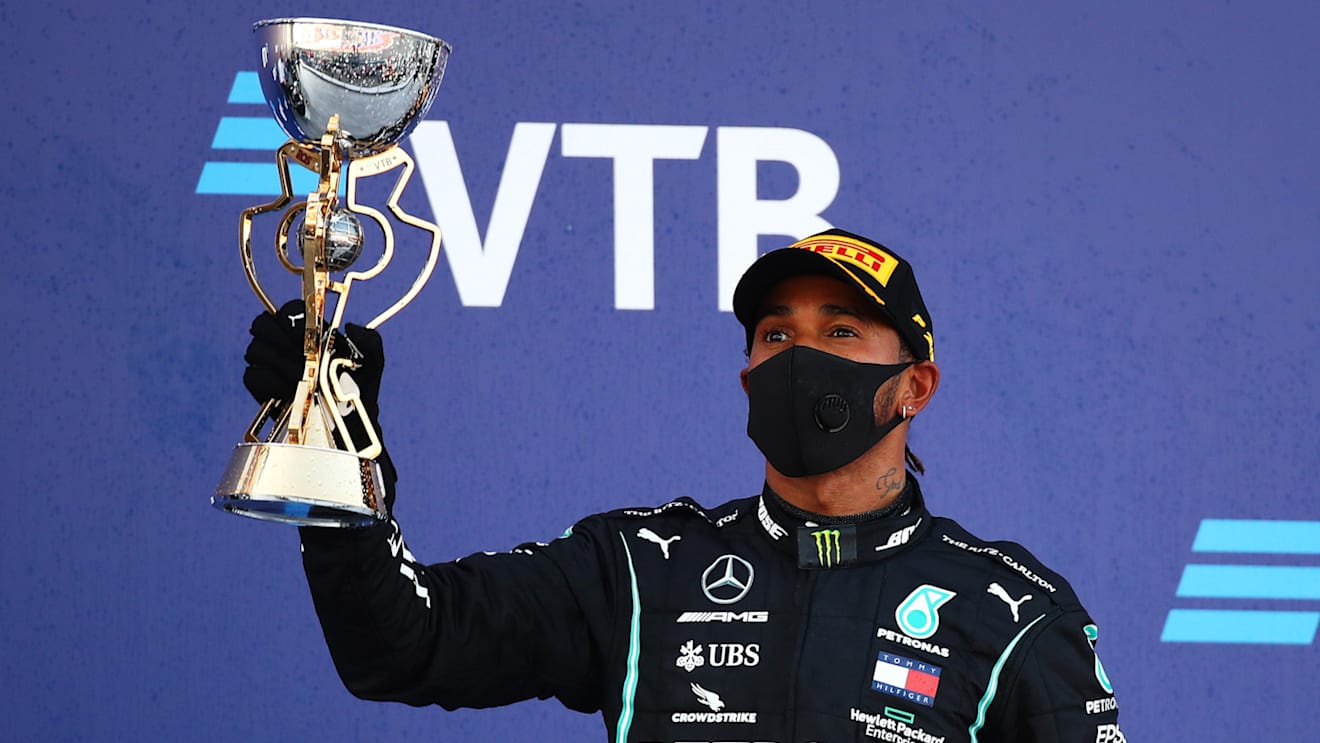 SOCHI, RUSSIA - SEPTEMBER 27: Third placed Lewis Hamilton of Great Britain and Mercedes GP celebrates on the podium during the F1 Grand Prix of Russia at Sochi Autodrom on September 27, 2020 in Sochi, Russia. (Photo by Bryn Lennon/Getty Images)