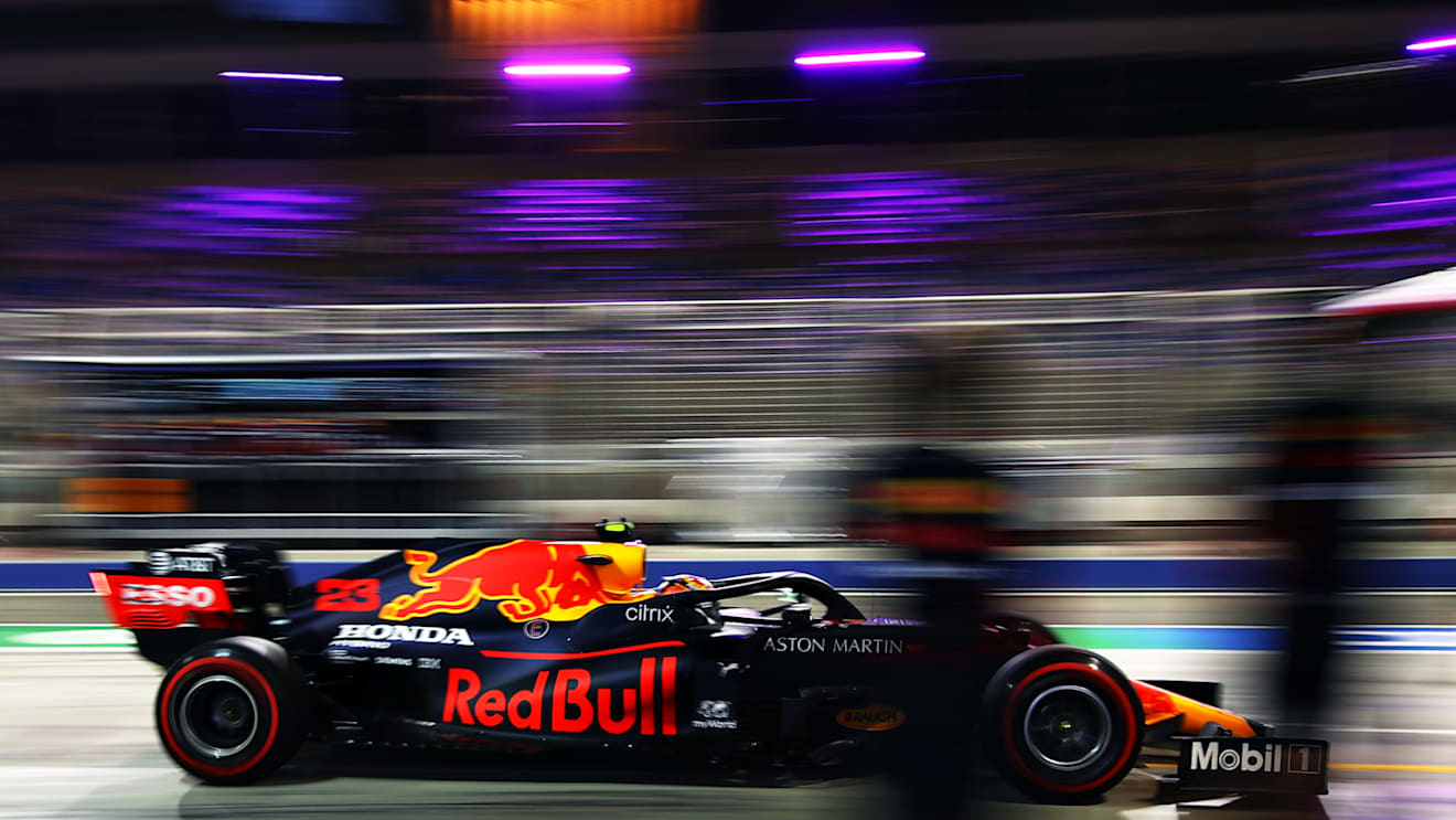 BAHRAIN, BAHRAIN - DECEMBER 04: Alexander Albon of Thailand driving the (23) Aston Martin Red Bull Racing RB16 stops in the Pitlane during practice ahead of the F1 Grand Prix of Sakhir at Bahrain International Circuit on December 04, 2020 in Bahrain, Bahrain. (Photo by Mark Thompson/Getty Images)